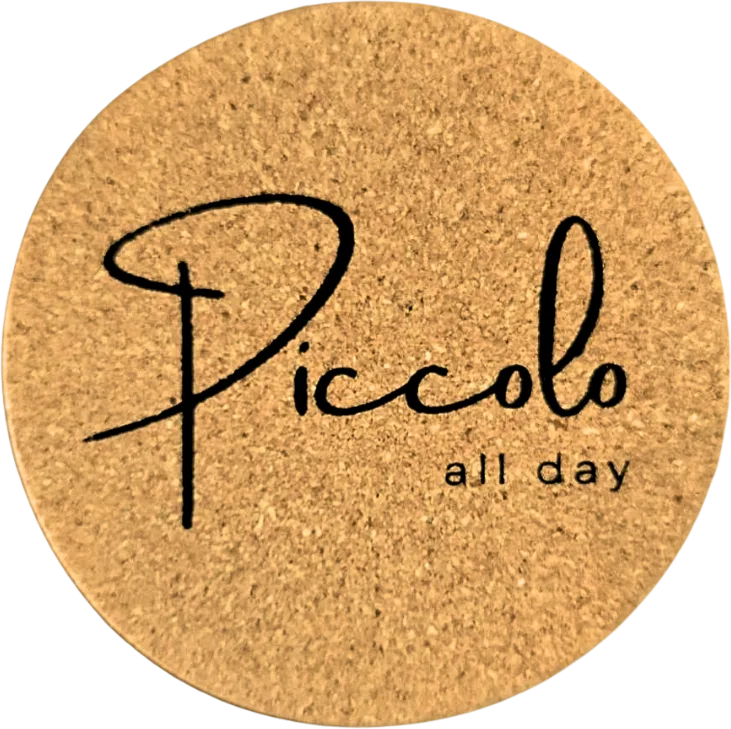 Client logo engraved on a Corkage coaster